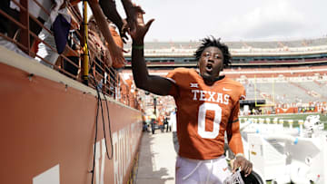 Oct 15, 2022; Austin, Texas, USA; Texas Longhorns linebacker DeMarvion Overshown (0) greets fans after a victory over the Iowa State Cyclones at Darrell K Royal-Texas Memorial Stadium.