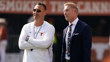 Sep 10, 2022; Austin, Texas, USA; Texas Longhorns head coach Steve Sarkisian talks with Fox Sports analyst Joel Klatt before the game against the Alabama Crimson Tide at Darrell K Royal-Texas Memorial Stadium. Mandatory Credit: Scott Wachter-Imagn Images