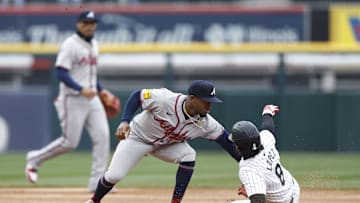 Apr 1, 2024; Chicago, Illinois, USA; Chicago White Sox second baseman Nicky Lopez (8) is caught stealing second base by Atlanta Braves second baseman Ozzie Albies (1) during the second inning at Guaranteed Rate Field. Mandatory Credit: Kamil Krzaczynski-Imagn Images