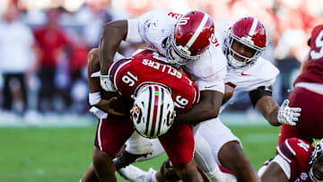 Oct 25, 2025; Columbia, South Carolina, USA; Alabama Crimson Tide linebacker Justin Jefferson (10) sacks South Carolina Gamecocks quarterback Lanorris Sellers (16) in the second quarter at Williams-Brice Stadium. Mandatory Credit: Jeff Blake-Imagn Images