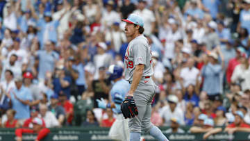 Jul 4, 2025; Chicago, Illinois, USA; St. Louis Cardinals starting pitcher Miles Mikolas (39) reacts after giving up a solo home run to Chicago Cubs designated hitter Seiya Suzuki during the first inning at Wrigley Field. Mandatory Credit: Kamil Krzaczynski-Imagn Images