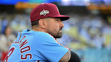 Oct 8, 2025; Los Angeles, California, USA; Philadelphia Phillies right fielder Nick Castellanos (8) looks on from the dugout during game three of the NLDS of the 2025 MLB playoffs against the Los Angeles Dodgers at Dodger Stadium.