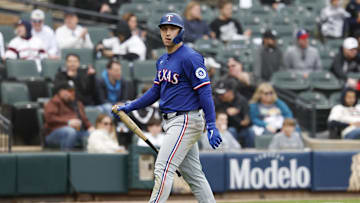 May 24, 2025; Chicago, Illinois, USA; Texas Rangers left fielder Wyatt Langford (36) reacts after striking out against the Chicago White Sox during the ninth inning at Rate Field. 
