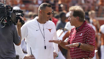 Sep 10, 2022; Austin, Texas, USA; Texas Longhorns head coach Steve Sarkisian talks with Alabama Crimson Tide head coach Nick Saban before the game at Darrell K Royal-Texas Memorial Stadium. Mandatory Credit: Scott Wachter-Imagn Images