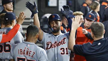 Jun 4, 2025; Chicago, Illinois, USA; Detroit Tigers left fielder Riley Greene (31) celebrates with teammates after scoring against the Chicago White Sox during the first inning at Rate Field.