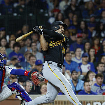 Pittsburgh Pirates outfielder Bryan Reynolds (10) hits a three-run home run against the Chicago Cubs during the eight inning against the Chicago Cubs at Wrigley Field on Sept 2.