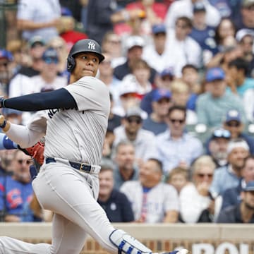 New York Yankees outfielder Juan Soto (22) singles against the Chicago Cubs during the third inning at Wrigley Field on Sept 6.