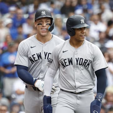 New York Yankees outfielder Aaron Judge (99) and New York Yankees outfielder Juan Soto (22) celebrate after scoring against the Chicago Cubs during the third inning at Wrigley Field on Sept 6.