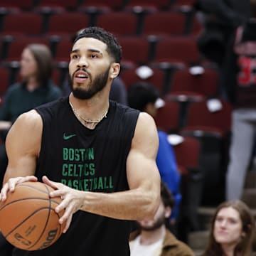 Dec 21, 2024; Chicago, Illinois, USA; Boston Celtics forward Jayson Tatum (0) warms up before a basketball game against the Chicago Bulls at United Center. Mandatory Credit: Kamil Krzaczynski-Imagn Images