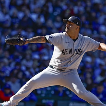 Sep 7, 2024; Chicago, Illinois, USA; New York Yankees relief pitcher Nestor Cortes (65) delivers a pitch against the Chicago Cubs during the eight inning at Wrigley Field. Mandatory Credit: Kamil Krzaczynski-Imagn Images