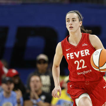 Aug 30, 2024; Chicago, Illinois, USA; Indiana Fever guard Caitlin Clark (22) brings the ball up court against the Chicago Sky during the first half at Wintrust Arena. Mandatory Credit: Kamil Krzaczynski-USA TODAY Sports