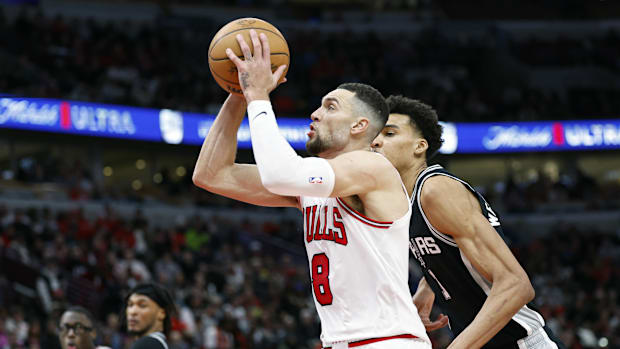 Chicago Bulls guard Zach LaVine (8) goes to the basket against San Antonio Spurs center Victor Wembanyama.