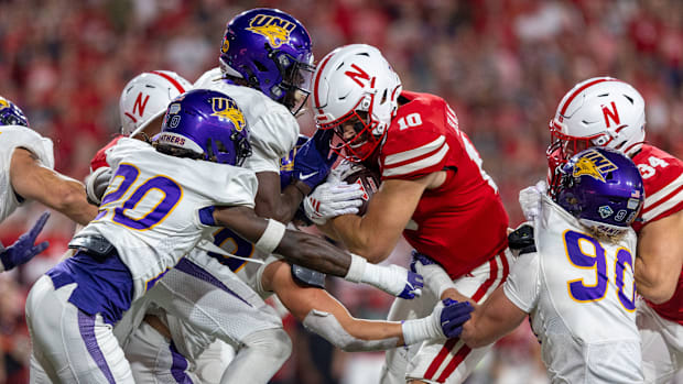 Nebraska quarterback Heinrich Haarberg rushes for a short gain against Northern Iowa.