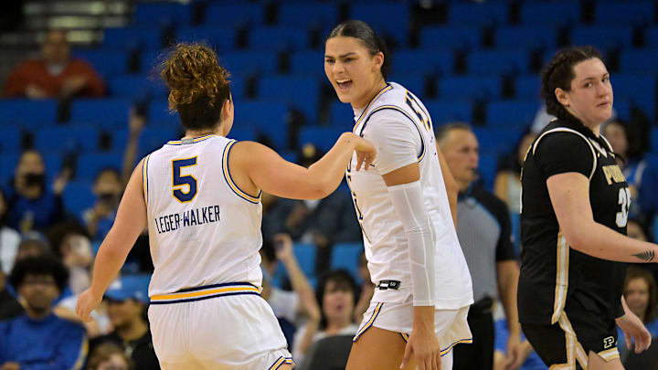 Jan 21, 2026; Los Angeles, California, USA;  UCLA Bruins center Lauren Betts (51) congratulates guard Charlisse Leger-Walker (5) after a 3-point basket in the second half against the Purdue Boilermakers at Pauley Pavilion presented by Wescom Financial. Mandatory Credit: Jayne Kamin-Oncea-Imagn Images