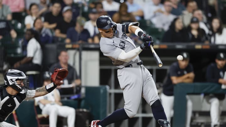 Aug 13, 2024; Chicago, Illinois, USA; New York Yankees outfielder Aaron Judge (99) singles against the Chicago White Sox during the seventh inning at Guaranteed Rate Field.