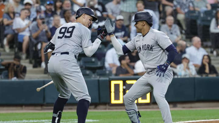 New York Yankees outfielder Juan Soto (22) celebrates with outfielder Aaron Judge (99) after hitting a two-run home run against the Chicago White Sox during the third inning at Guaranteed Rate Field on Aug 13.