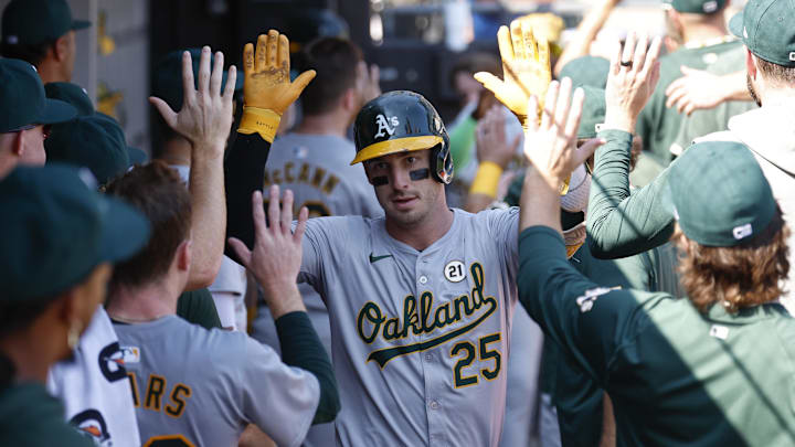 Oakland Athletics outfielder Brent Rooker (25) celebrates with teammates after hitting a two-run home run against the Chicago White Sox during the fifth inning at Guaranteed Rate Field on Sept 15.