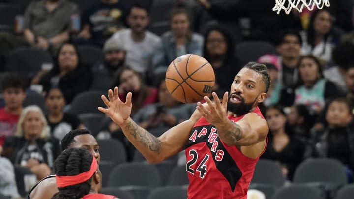 Nov 2, 2022; San Antonio, Texas, USA; Toronto Raptors center Khem Birch (24) goes after a loose ball during the second half against the San Antonio Spurs at AT&T Center. Mandatory Credit: Scott Wachter-USA TODAY Sports