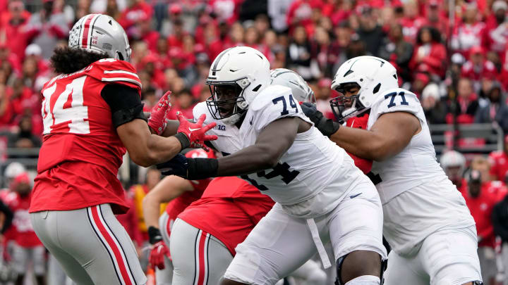 Oct 21, 2023; Columbus, Ohio, USA; Ohio State Buckeyes defensive end JT Tuimoloau (44) goes up against Penn State Nittany Lions offensive lineman Olumuyiwa Fashanu (74) during the third quarter of their game at Ohio Stadium.