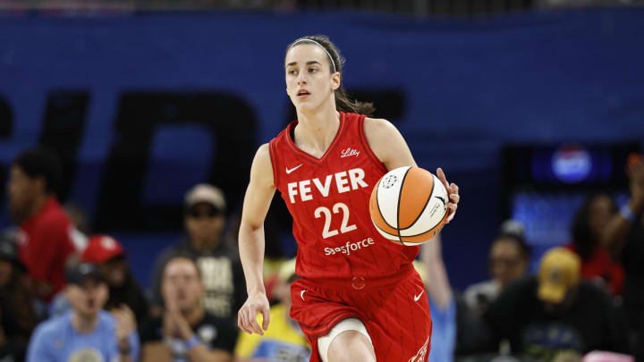 Aug 30, 2024; Chicago, Illinois, USA; Indiana Fever guard Caitlin Clark (22) brings the ball up court against the Chicago Sky during the first half at Wintrust Arena. Mandatory Credit: Kamil Krzaczynski-USA TODAY Sports