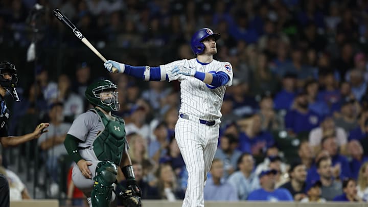 Chicago Cubs outfielder Ian Happ watches his home run ball fly during the third inning of Tuesday's loss to the Oakland Athletics at Wrigley Field. 