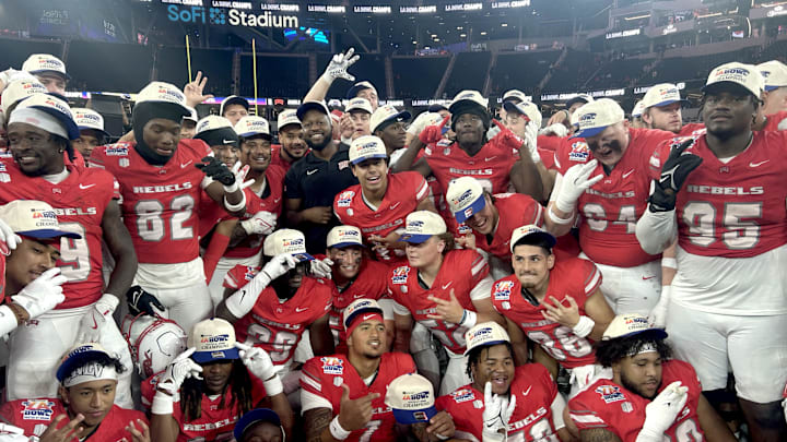 The UNLV Rebels celebrate after defeating the California Golden Bears in the LA Bowl at SoFi Stadium. The UNLV Rebels celebrate after defeating the California Golden Bears in the LA Bowl at SoFi Stadium.