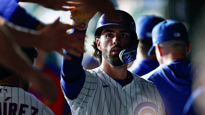 Aug 4, 2026; Chicago, Illinois, USA; Chicago Cubs shortstop Dansby Swanson (7) celebrates in the dugout after scoring against the Los Angeles Dodgers during the seventh inning at Wrigley Field. Mandatory Credit: Kamil Krzaczynski-Imagn Images