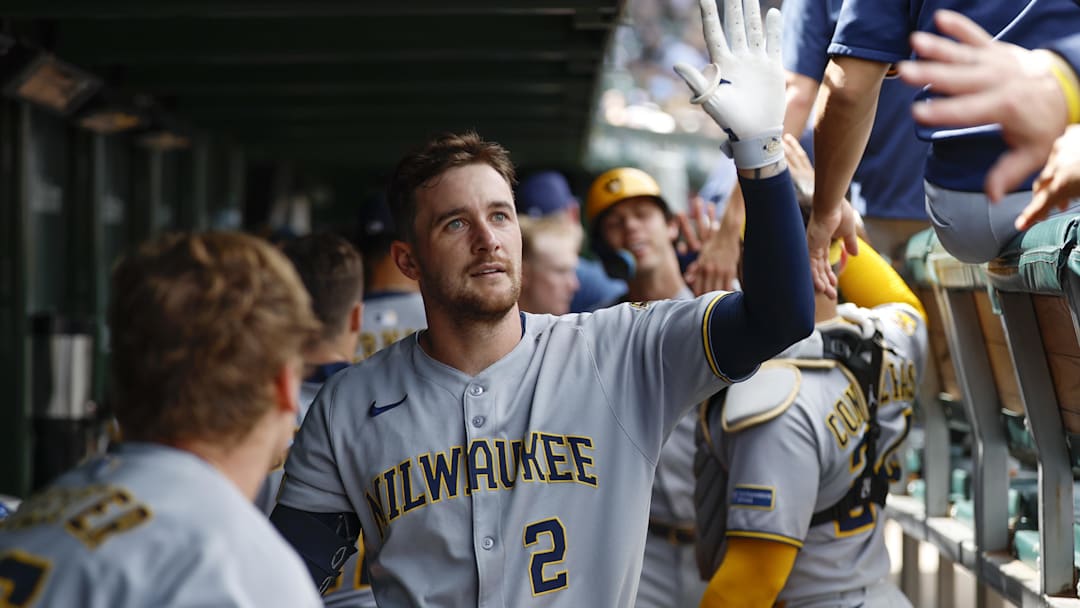 Aug 21, 2025; Chicago, Illinois, USA; Milwaukee Brewers second baseman Brice Turang (2) celebrates with teammates in the dugout after hitting a two-run home run against the Chicago Cubs during the second inning at Wrigley Field. Mandatory Credit: Kamil Krzaczynski-Imagn Images Aug 21, 2025; Chicago, Illinois, USA; Milwaukee Brewers second baseman Brice Turang (2) celebrates with teammates in the dugout after hitting a two-run home run against the Chicago Cubs during the second inning at Wrigley Field. Mandatory Credit: Kamil Krzaczynski-Imagn Images