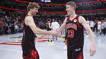 Oct 31, 2025; Chicago, Illinois, USA; Chicago Bulls forward Matas Buzelis (14) celebrates with guard Kevin Huerter (13) after team's win against the New York Knicks at United Center. Mandatory Credit: Kamil Krzaczynski-Imagn Images
