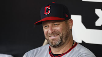 Aug 8, 2025; Chicago, Illinois, USA; Cleveland Guardians manager Stephen Vogt (12) looks on from the dugout before a baseball game against the Chicago White Sox at Rate Field. Mandatory Credit: Kamil Krzaczynski-Imagn Images