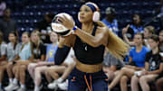 Connecticut Sun guard DiJonai Carrington (21) warms up before a basketball game against the Chicago Sky.