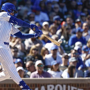 Sep 7, 2024; Chicago, Illinois, USA; Chicago Cubs outfielder Cody Bellinger (24) singles against the New York Yankees during the fourth inning at Wrigley Field.