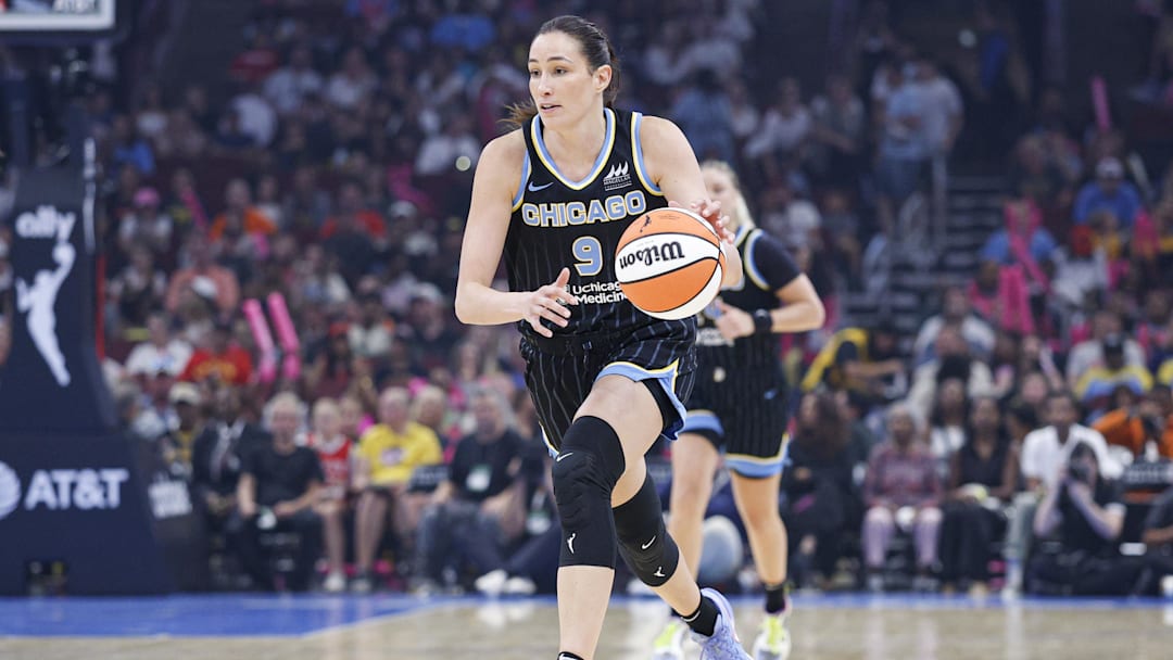Jul 27, 2025; Chicago, Illinois, USA; Chicago Sky guard Rebecca Allen (9) drives to the basket against the Indiana Fever during the second half at United Center. Mandatory Credit: Kamil Krzaczynski-Imagn Images