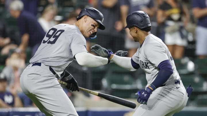 Aug 13, 2024; Chicago, Illinois, USA; New York Yankees outfielder Juan Soto celebrates with outfielder Aaron Judge.