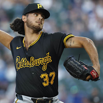 Pittsburgh Pirates starting pitcher Jared Jones (37) delivers a pitch against the Chicago Cubs during the first inning at Wrigley Field. 