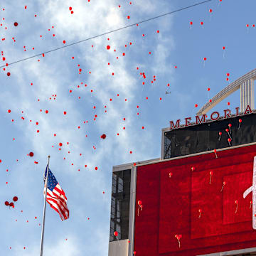 Nebraska fans let red balloons loose after the first touchdown of the game against Colorado.