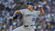 Kansas City Royals starting pitcher Rich Hill delivers a pitch against the Chicago Cubs during the first inning at Wrigley Field. 