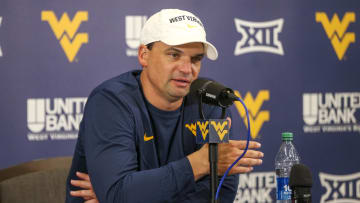 West Virginia Mountaineers head coach Neal Brown speaks with the media after defeating the Texas Tech Red Raiders at Mountaineer Field at Milan Puskar Stadium.
