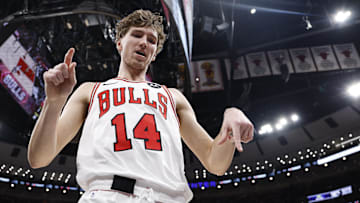 Nov 22, 2025; Chicago, Illinois, USA; Chicago Bulls forward Matas Buzelis (14) reacts after scoring against the Washington Wizards during the first half at United Center. Mandatory Credit: Kamil Krzaczynski-Imagn Images