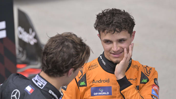 Jun 9, 2024; Montreal, Quebec, CAN; McLaren driver Lando Norris (GBR) (right) talks with Mercedes driver George Russell (GBR)  after the Canadian Grand Prix at Circuit Gilles Villeneuve. Mandatory Credit: Eric Bolte-USA TODAY Sports