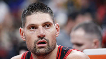 Dec 7, 2025; Chicago, Illinois, USA; Chicago Bulls center Nikola Vucevic (9) looks on from the bench during the first half at United Center. Mandatory Credit: Kamil Krzaczynski-Imagn Images