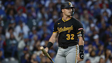 Sep 2, 2024; Chicago, Illinois, USA; Pittsburgh Pirates catcher Henry Davis (32) reacts after striking out against the Chicago Cubs during the third inning at Wrigley Field. Mandatory Credit: Kamil Krzaczynski-Imagn Images