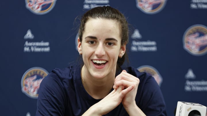 Jun 23, 2024; Chicago, Illinois, USA; Indiana Fever guard Caitlin Clark (22) speaks during a press conference before a game against the Chicago Sky at Wintrust Arena.