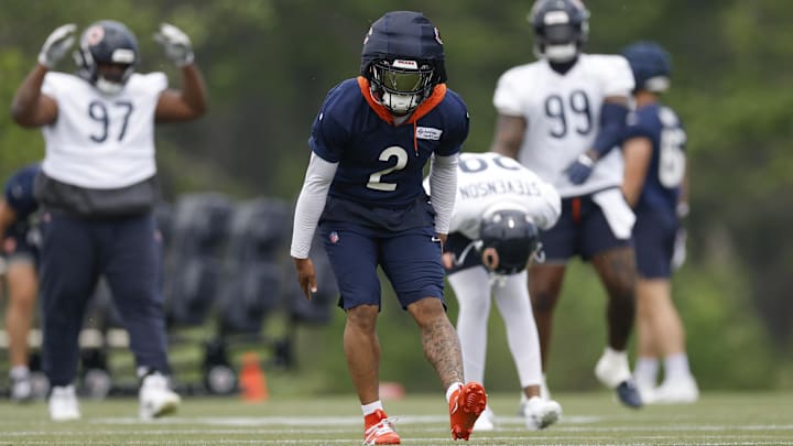 DJ Moore goes through stretching during the start to Bears offseason practices. DJ Moore goes through stretching during the start to Bears offseason practices.