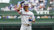 Sep 6, 2025; Chicago, Illinois, USA; Washington Nationals left fielder Daylen Lile (51) celebrates after hitting a single against the Chicago Cubs during the first inning at Wrigley Field. 