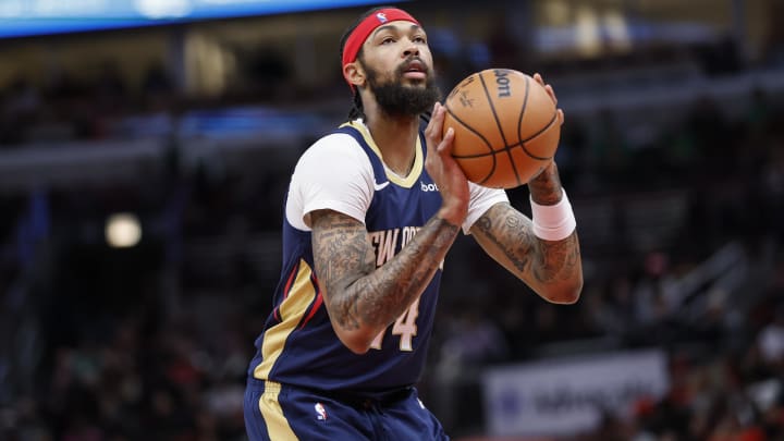 Dec 2, 2023; Chicago, Illinois, USA; New Orleans Pelicans forward Brandon Ingram (14) shoots a free throw against the Chicago Bulls during the first half at United Center. 