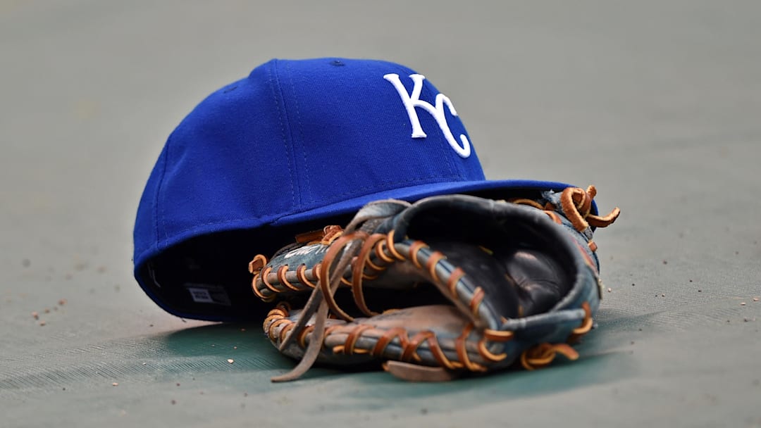 Kansas City, MO, USA; A general view of the hat and glove of Kansas City Royals first basemen Eric Hosmer the field prior to a game against the Oakland Athletics at Kauffman Stadium.