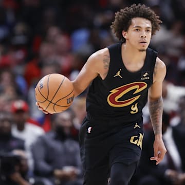 Dec 23, 2023; Chicago, Illinois, USA; Cleveland Cavaliers guard Craig Porter (9) brings the ball up court against the Chicago Bulls during the second half at United Center. Mandatory Credit: Kamil Krzaczynski-Imagn Images