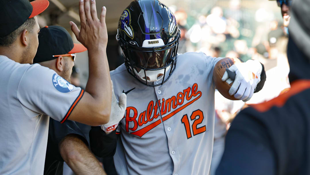 Sep 17, 2025; Chicago, Illinois, USA; Baltimore Orioles left fielder Dylan Beavers (12) celebrates with teammates in the dugout after hitting a two-run home run against the Chicago White Sox during the fourth inning at Rate Field. Mandatory Credit: Kamil Krzaczynski-Imagn Images