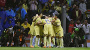 Jugadores del Améric acelebran un gol.